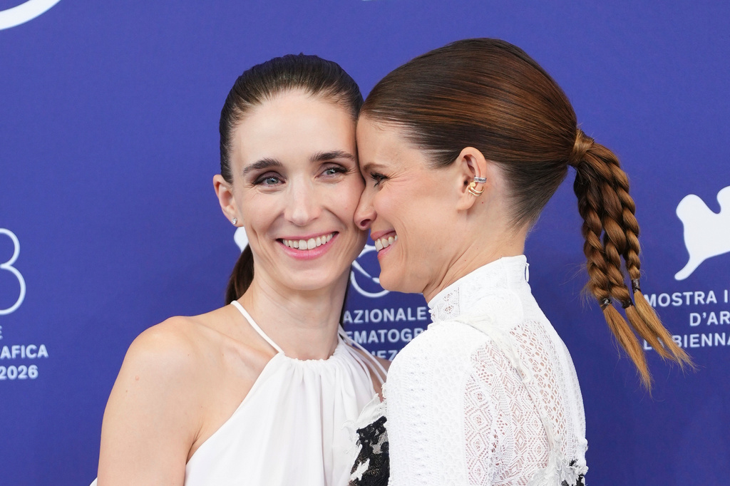 Rooney Mara, left, and Kate Mara pose for photographers at the photo call for the film 'Bucking Fastard" during the 83rd edition of the Venice Film Festival in Venice, Italy, on Thursday, Sept. 3, 2026. (Photo by Scott A Garfitt/Invision/AP)