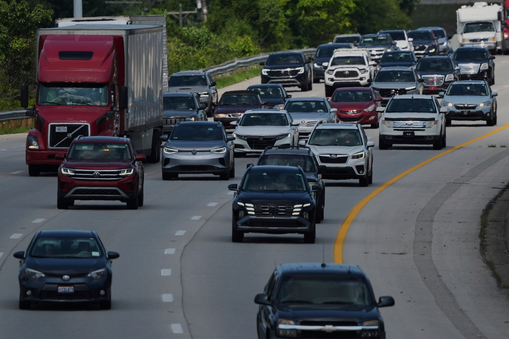 FILE - Vehicles drive along a highway July 30, 2025, in Cincinnati. (AP Photo/Joshua A. Bickel, File)