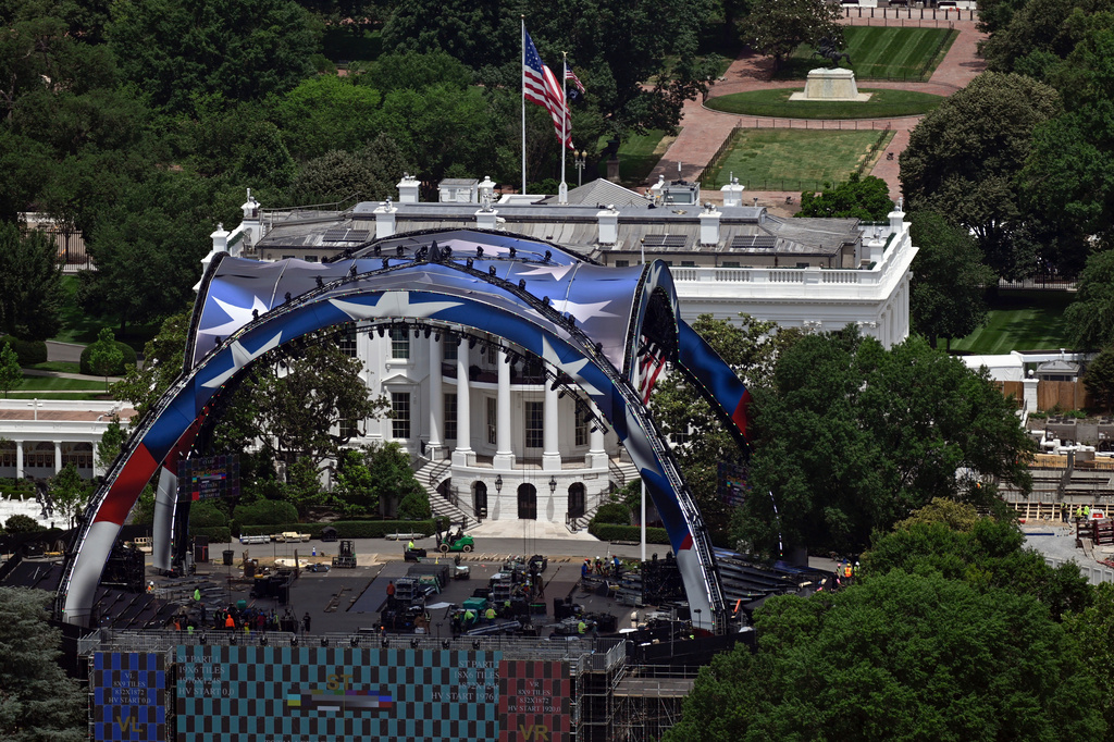 Construction continues on the arena on the South Lawn of the White House for a future UFC mixed martial arts fight, Saturday, June 6, 2026, in Washington. (AP Photo/John McDonnell)