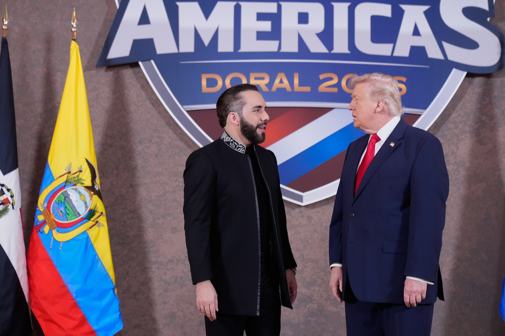 FILE - President Donald Trump greets El Salvador's President Nayib Bukele, left, at the Shield of the Americas Summit, March 7, 2026, at Trump National Doral Miami in Doral, Fla. (AP Photo/Mark Schiefelbein, File)