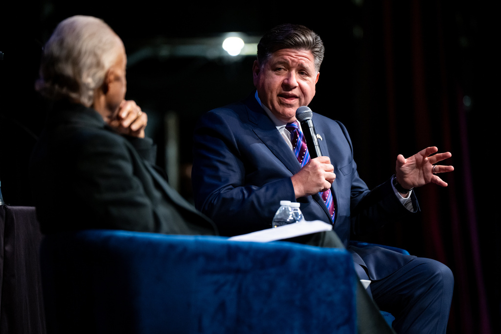 Illinois Gov. J.B. Pritzker speaks at the National Action Network Convention, accompanied by the Rev. Al Sharpton, in New York, Thursday, April 9, 2026. (AP Photo/Angelina Katsanis)