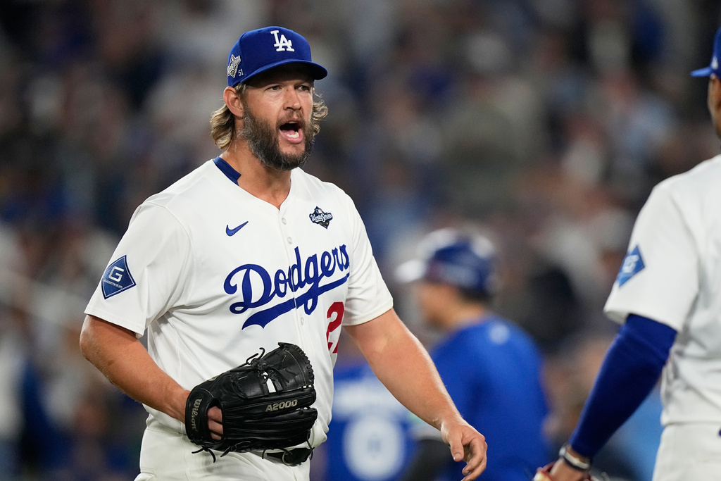 FILE - Los Angeles Dodgers pitcher Clayton Kershaw celebrates the end of the top of the 12th inning against the Toronto Blue Jays in Game 3 of baseball's World Series, Monday, Oct. 27, 2025, in Los Angeles. (AP Photo/Brynn Anderson, File)