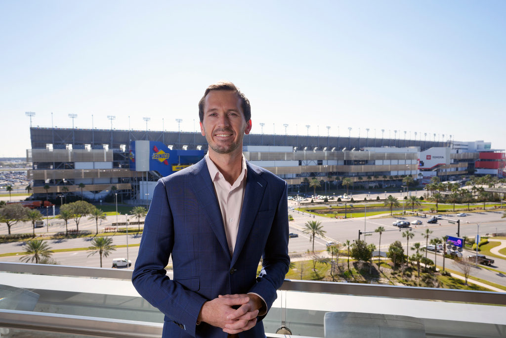 FILE - Ben Kennedy, NASCAR Senior Vice President of Racing Development and Strategy for NASCAR at his offices overlooking Daytona International Speedway, Jan. 27, 2023, in Daytona Beach, Fla. (AP Photo/John Raoux, file)