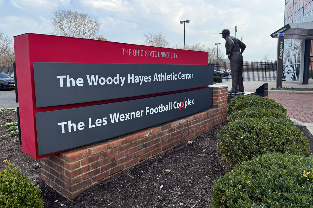 A sign is seen outside of the Les Wexner Football Complex at the Wood Hayes Athletic Center, Monday, March 30, 2026, in Columbus, Ohio. (AP Photo/Patrick Aftoora-Orsagos)