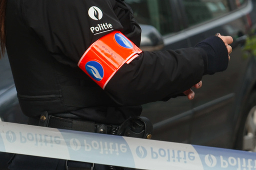 In this image taken from video provided by VTM, a police officer stands behind a cordon during an investigation in Antwerp, Belgium, Thursday, Oct. 9, 2025. (VTM via AP) In this image taken from video provided by VTM, a police officer stands behind a cordon during an investigation in Antwerp, Belgium, Thursday, Oct. 9, 2025. (VTM via AP)