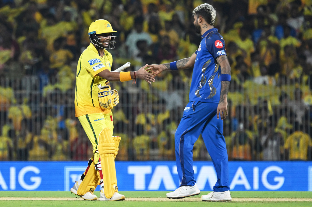 Chennai Super Kings' Kartik Sharma, left, is congratulated by Mumbai Indians' captain Hardik Pandya after Chennai Super Kings won the Indian Premier League cricket match between against Mumbai Indians in Chennai, India, Saturday, May 2, 2026. (AP Photo)