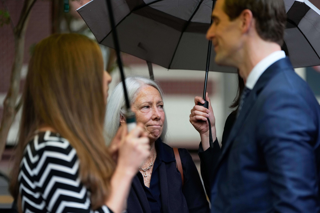 Patrice Failor, wife of former FBI Director James Comey, arrives outside federal court in Alexandria, Va., Wednesday, Oct. 8, 2025. (AP Photo/Alex Brandon)