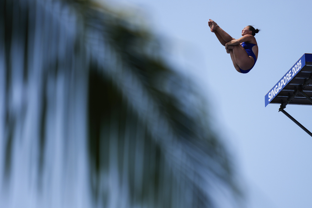 United States Meili Carpenter dives during the women's 20m platform preliminary competition at the World Aquatics Championships in Singapore, Thursday, July 24, 2025. (AP Photo/Vincent Thian)