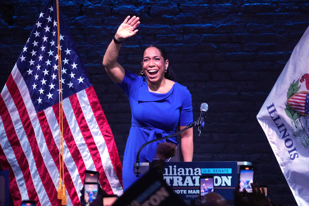 Illinois Lt. Gov. Juliana Stratton waves during a primary election night watch party after winning the Democratic primary for U.S. Senate, Tuesday, March 17, 2026, in Chicago. (AP Photo/Erin Hooley)