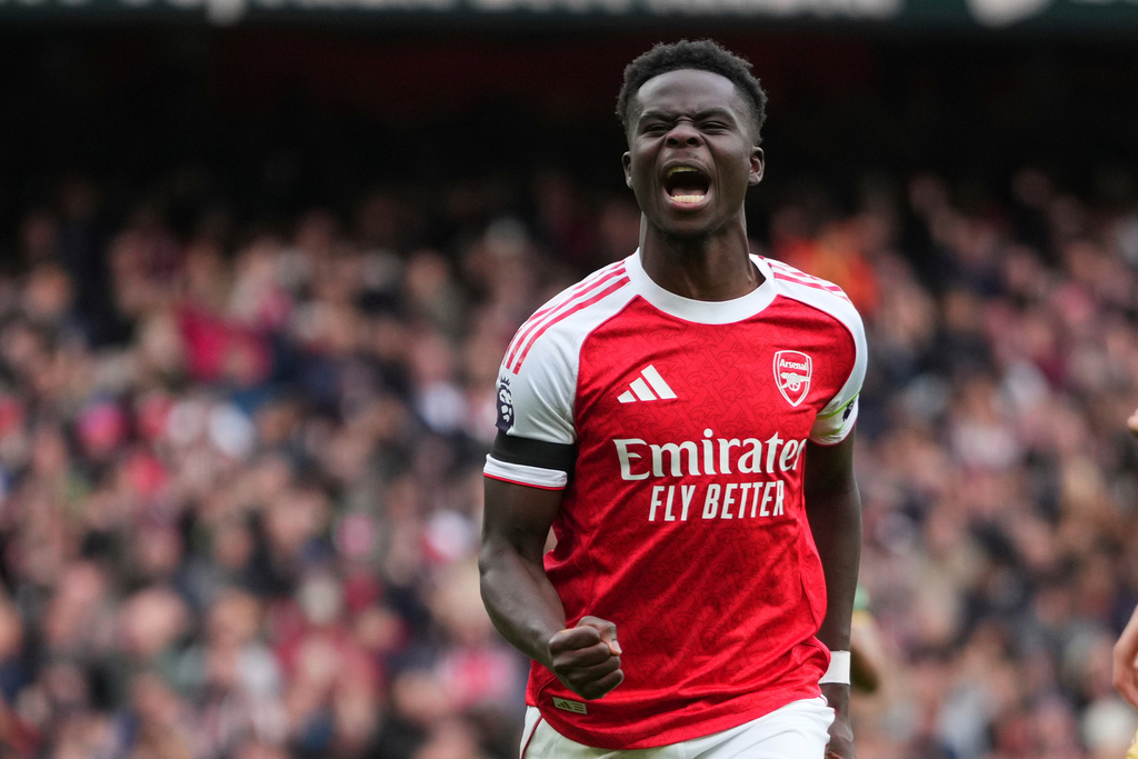 CORRECTS THE NUMBER OF A GOAL - Arsenal's Bukayo Saka celebrates after scoring his side's second goal during the English Premier League soccer match between Arsenal and West Ham United at the Emirates stadium in London, Saturday, Oct. 4, 2025. (AP Photo/Kirsty Wigglesworth)