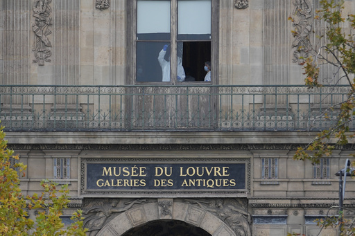 Police officers work inside the Louvre museum, Sunday, Oct. 19, 2025 in Paris. (AP Photo/Thibault Camus) Police officers work inside the Louvre museum, Sunday, Oct. 19, 2025 in Paris. (AP Photo/Thibault Camus)