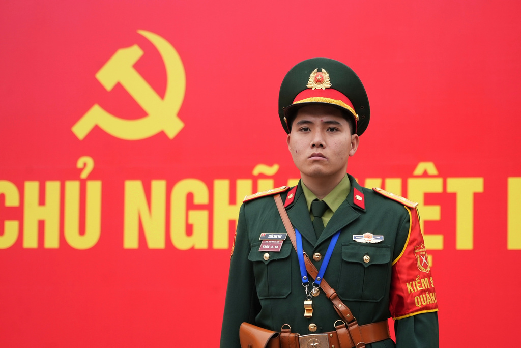 A security officer guards the entrance ofthe National Convention Center during the week-long Congress of the Communist Party of Vietnam in Hanoi, Vietnam, Monday, Jan. 19, 2026. (AP Photo/Hau Dinh)