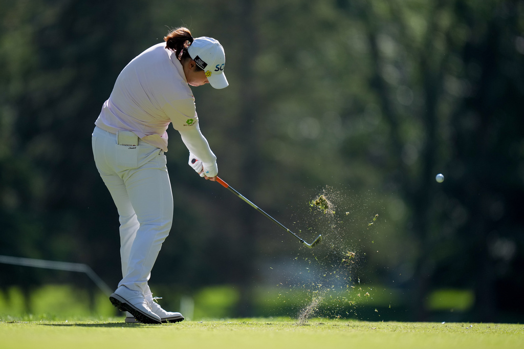 Ariya Jutanugarn, of Thailand, hits her tee shot on the 13th hole during the second round of the LPGA Women's Open golf tournament, in Edmonton, on Friday, Aug. 21, 2026. (Darryl Dyck/The Canadian Press via AP)