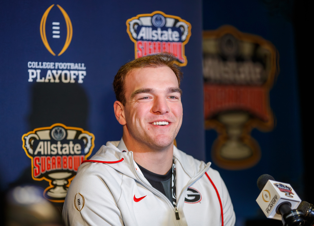 Georgia quarterback Gunner Stockton (14) talks with reporters during the Sugar Bowl Media Day in New Orleans, Tuesday, Dec. 30, 2025. (David Grunfeld /The Times-Picayune/The New Orleans Advocate via AP)