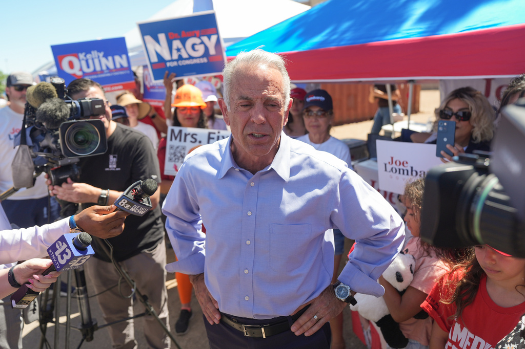 FILE - Nevada Gov. Joe Lombardo talks to reporters outside a vote center June 9, 2026, in Las Vegas. (AP Photo/Jae C. Hong, File)
