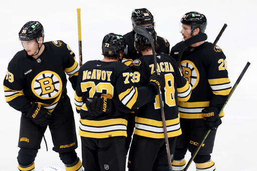 Boston Bruins celebrate a goal by center Morgan Geekie (39) during the third period of an NHL hockey game against the New York Islanders, Tuesday, Oct. 28, 2025, in Boston. (AP Photo/Mark Stockwell) Boston Bruins celebrate a goal by center Morgan Geekie (39) during the third period of an NHL hockey game against the New York Islanders, Tuesday, Oct. 28, 2025, in Boston. (AP Photo/Mark Stockwell)