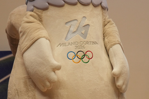 2026 Milan Cortina Winter Olympic podiums are unveiled in Milan, Italy, Wednesday, Oct. 29, 2025, with the mascots Tina and Milo during a press conference marking 100 days to go until the 2026 Milan Cortina Winter Olympics. (AP Photo/Antonio Calanni) 2026 Milan Cortina Winter Olympic podiums are unveiled in Milan, Italy, Wednesday, Oct. 29, 2025, with the mascots Tina and Milo during a press conference marking 100 days to go until the 2026 Milan Cortina Winter Olympics. (AP Photo/Antonio Calanni)
