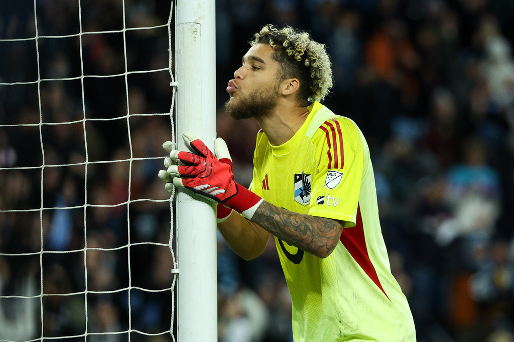 Minnesota United goalkeeper Dayne St. Clair (97) reacts during a penalty shootout in Game 1 of the first round of MLS soccer's Western Conference playoffs against Seattle Sounders, Monday, Oct. 27, 2025, in St. Paul, Minn. (AP Photo/Matt Krohn)