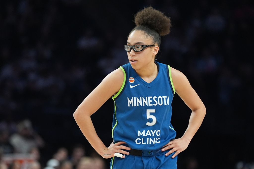 Minnesota Lynx guard Olivia Miles (5) stands on the court during the second half of a WNBA basketball game against the Toronto Tempo Thursday, May 21, 2026, in Minneapolis. (AP Photo/Abbie Parr)