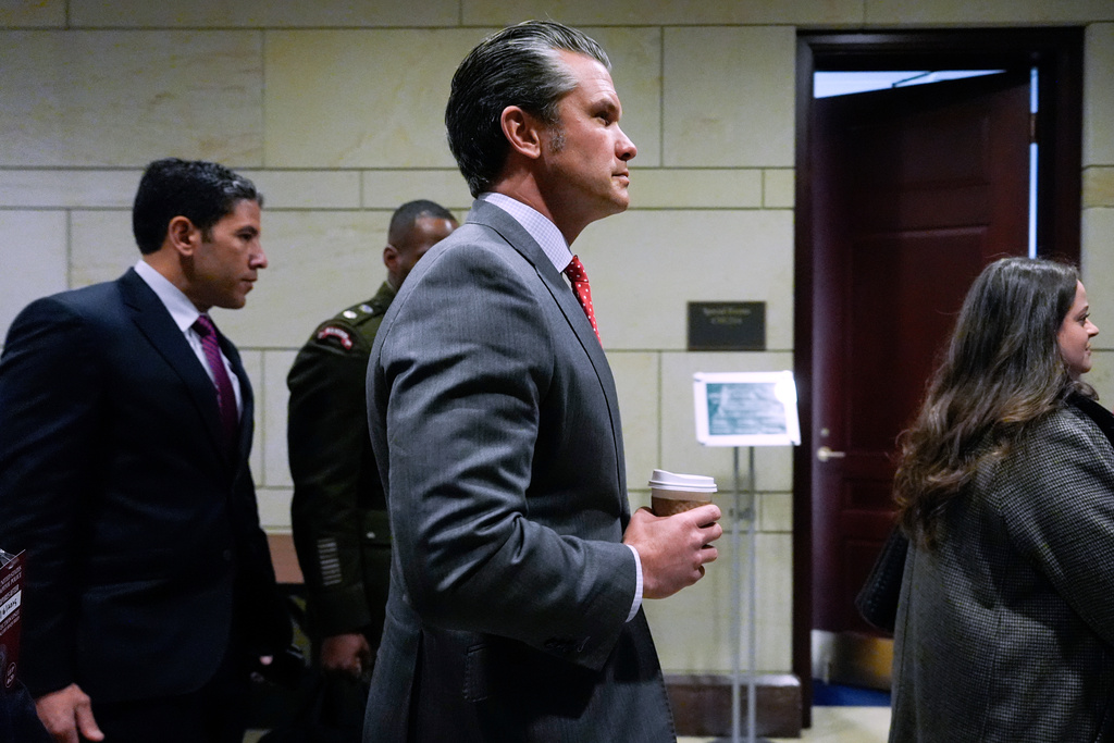 Defense Secretary Pete Hegseth arrives to brief members of Congress on military strikes near Venezuela, Tuesday, Dec. 16, 2025, at the Capitol in Washington. (AP Photo/Julia Demaree Nikhinson)