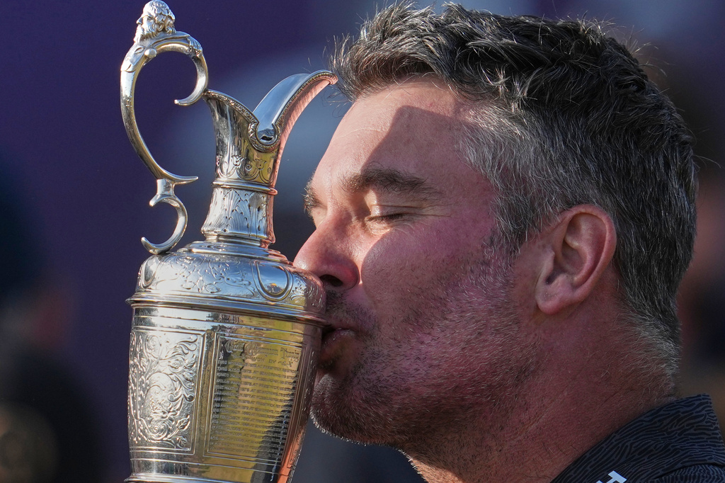 Ryan Fox of New Zealand kisses the Claret Jug trophy after winning the British Open Golf championships at Royal Birkdale golf club, in Southport, England, Sunday, July 19, 2026. (AP Photo/Jon Super)