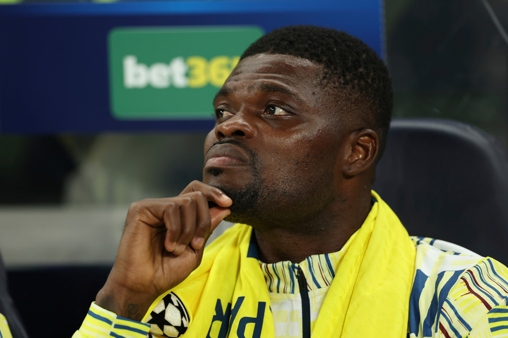 FILE - Villarreal's Thomas Partey sits on the bench during the Champions League soccer match between Tottenham and Villarreal in London, Tuesday, Sept. 16, 2025. (AP Photo/Ian Walton, File)