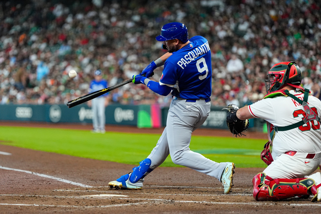 Italy first baseman Vinnie Pasquantino hits a home run in the second inning of a World Baseball Classic game against Mexico, Wednesday, March 11, 2026, in Houston. (AP Photo/Ashley Landis)