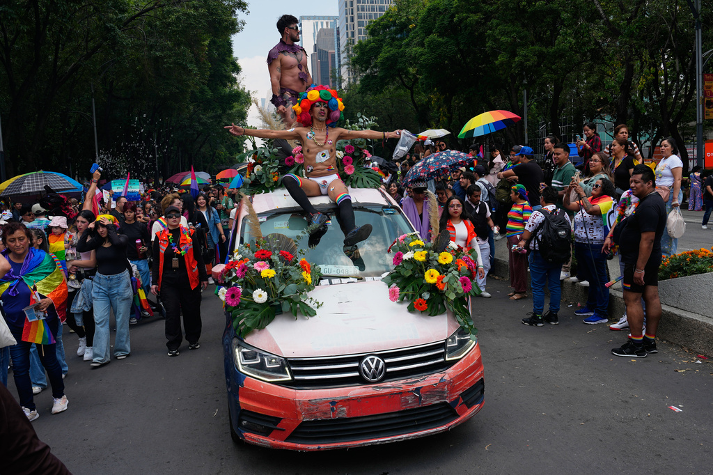 Participants take part in the annual Pride Parade in Mexico City, Saturday, June 26, 2026. (AP Photo/Marco Ugarte)