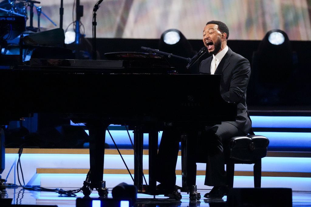 John Legend performs 'Hero' during MusiCares Person of the Year honoring Mariah Carey on Friday, Jan. 30, 2026, in Los Angeles. (AP Photo/Chris Pizzello)