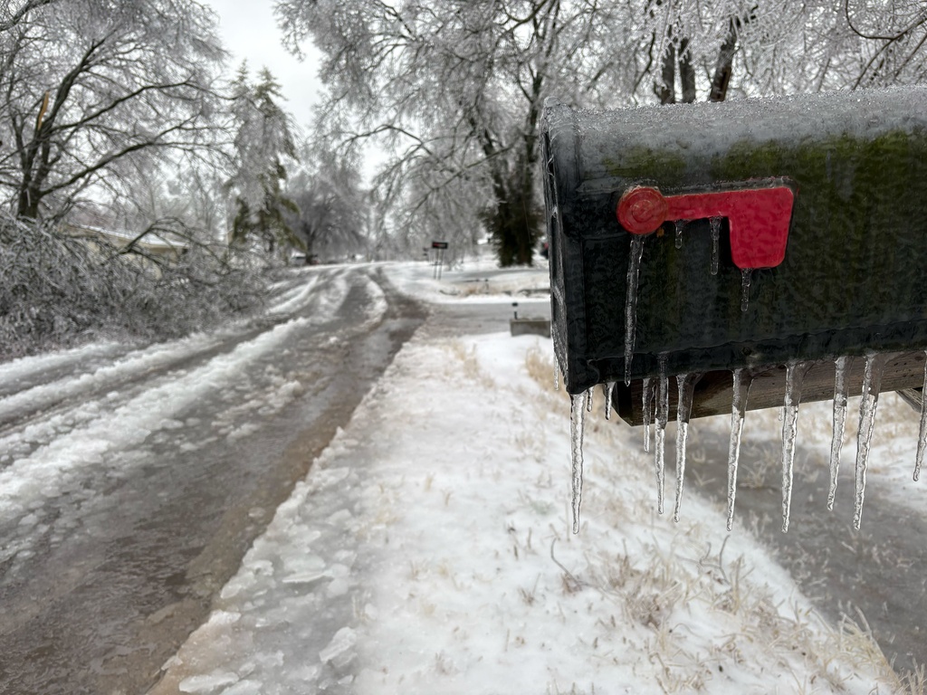 Icicles form on a mailbox on a neighborhood street as a winter storm moves through Nashville, Tenn,, Sunday, Jan,. 25, 2026. (AP Photo/Holly Meyer)
