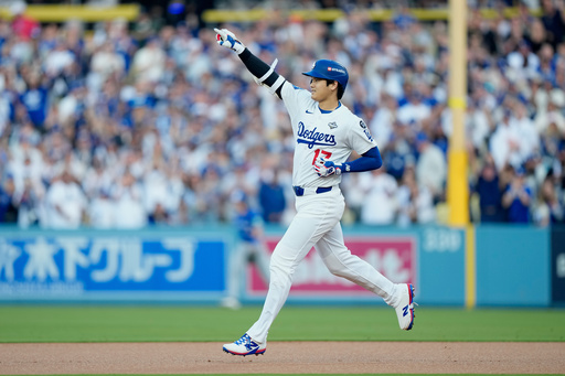 Los Angeles Dodgers' Shohei Ohtani celebrates a double against the Toronto Blue Jays during the first inning in Game 3 of baseball's World Series, Monday, Oct. 27, 2025, in Los Angeles. (AP Photo/Brynn Anderson) Los Angeles Dodgers' Shohei Ohtani celebrates a double against the Toronto Blue Jays during the first inning in Game 3 of baseball's World Series, Monday, Oct. 27, 2025, in Los Angeles. (AP Photo/Brynn Anderson)