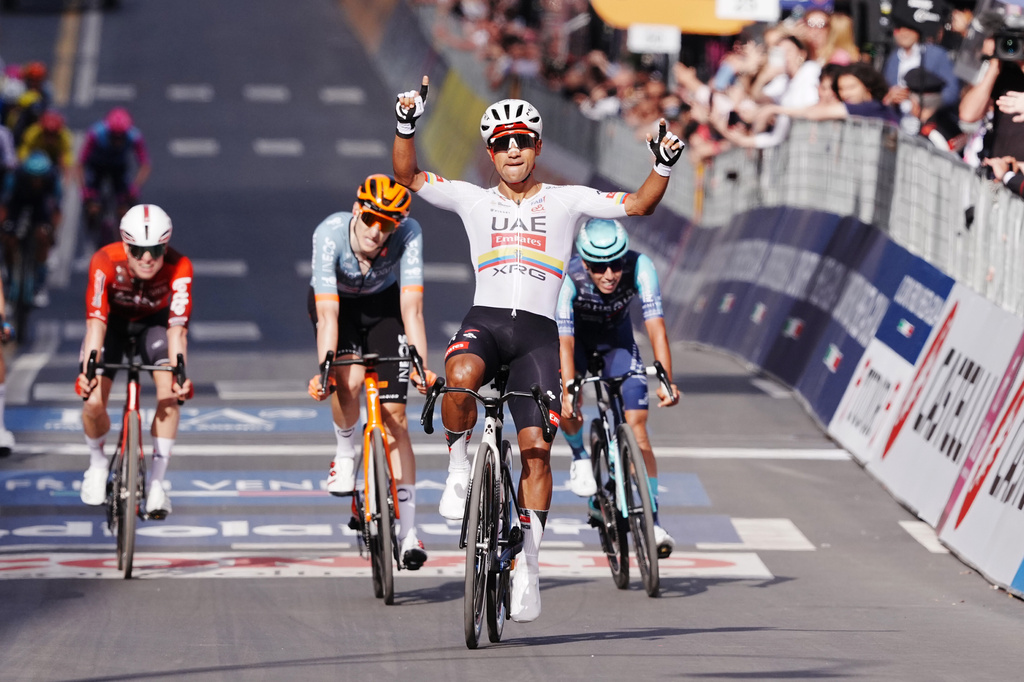 Ecuador's Manuel Jhonatan Narvaez celebrates winning the 4th stage of the Giro d'Italia cycling race, from Catanzaro to Cosenza, Italy, Tuesday, May 12, 2026. (Gian Mattia d'Alberto/LaPresse via AP)