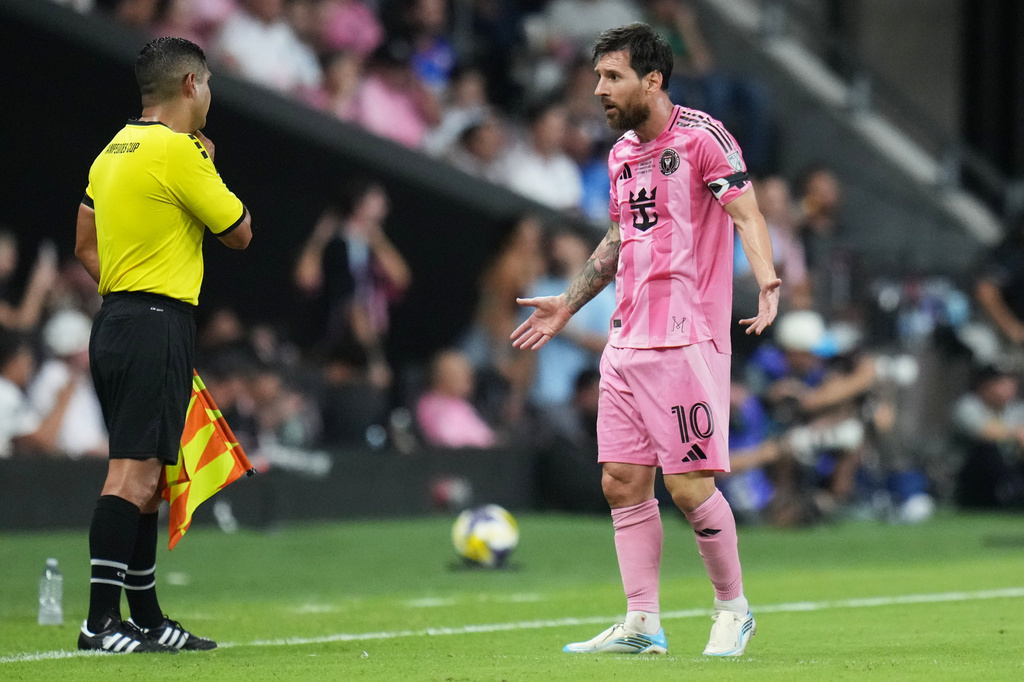 Inter Miami forward Lionel Messi (10) talks with an official during the first half of the Campeones Cup soccer match against Cruz Azul, Wednesday, Sept. 16, 2026, in Miami. (AP Photo/Lynne Sladky)