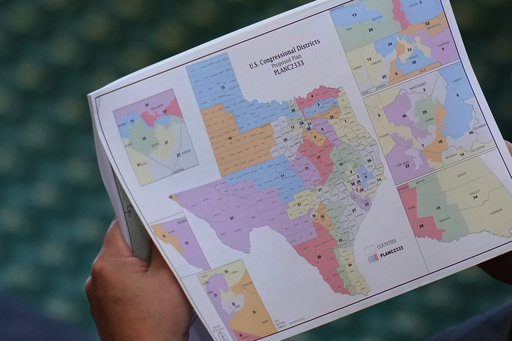 FILE - Texas state Sen. Pete Flores, R-Pleasanton, looks over a redrawn U.S. congressional map during debate over a bill in the Senate Chamber at the Texas Capitol in Austin, Texas, Aug. 22, 2025. (AP Photo/Eric Gay, File) FILE - Texas state Sen. Pete Flores, R-Pleasanton, looks over a redrawn U.S. congressional map during debate over a bill in the Senate Chamber at the Texas Capitol in Austin, Texas, Aug. 22, 2025. (AP Photo/Eric Gay, File)