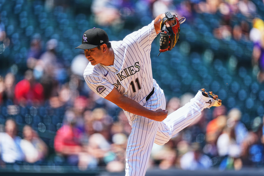 Colorado Rockies pitcher Tomoyuki Sugano works against the Tampa Bay Rays in the first inning of a baseball game in Denver, Wednesday, Aug. 5, 2026. (AP Photo/David Zalubowski)