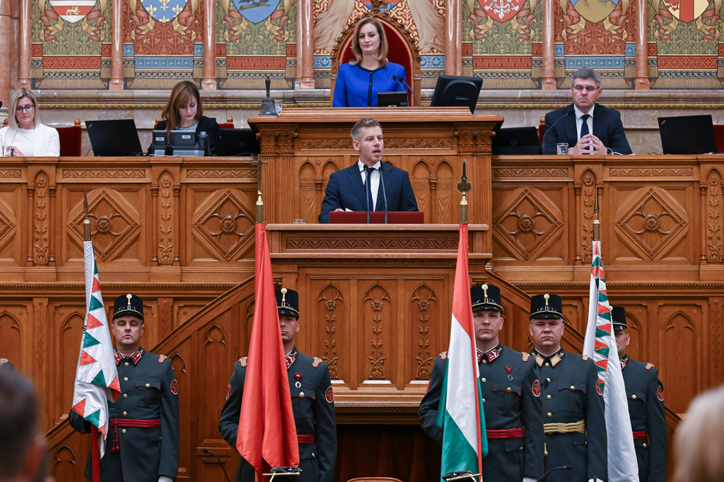 FILE - Hungary's Prime Minister Peter Magyar speaks, accompanied by Speaker of the Parliament Agnes Forsthoffer, top center, during the plenary session of the new National Assembly following the appointment ceremony of the Tisza cabinet in Budapest, Hungary, Tuesday, May 12, 2026. (Tibor Illyes/MTI via AP, File)