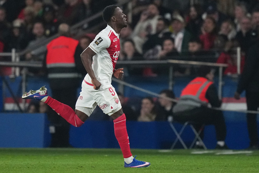 Monaco's Folarin Balogun celebrates scoring his side's 3rd goal during the French League One soccer match between Paris Saint-Germain and Monaco in Paris, Friday, March 6, 2026. (AP Photo/Thibault Camus)