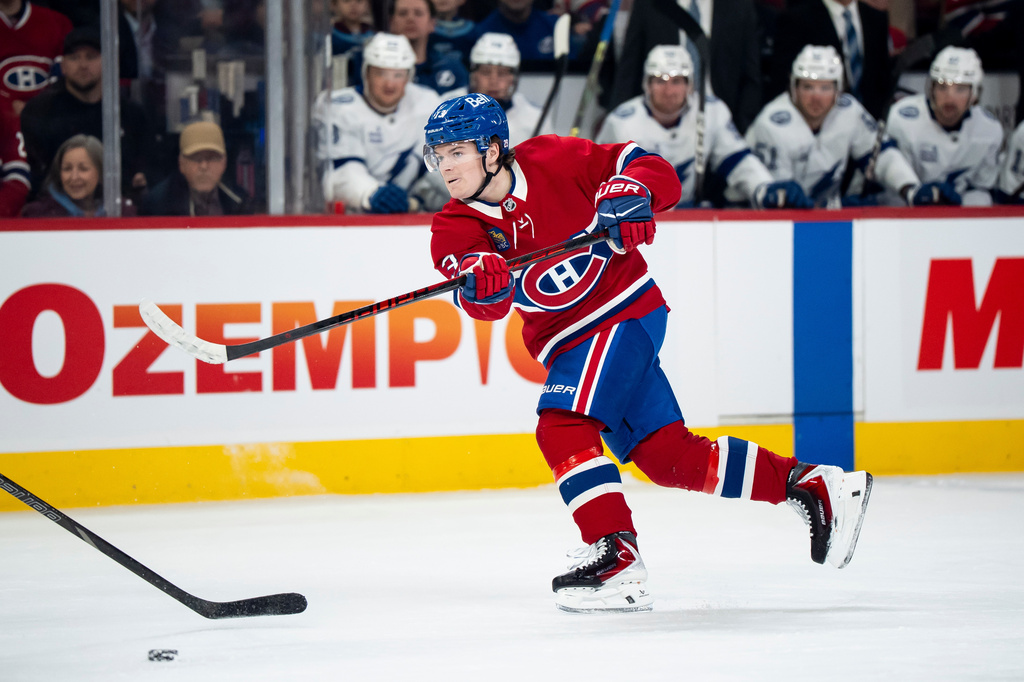 Montreal Canadiens' Cole Caufield shoots during first-period NHL hockey game action against the Tampa Bay Lightning in Montreal, Thursday, April 9, 2026. (Christopher Katsarov/The Canadian Press via AP)
