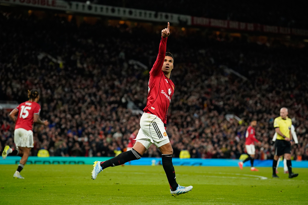 Manchester United's Casemiro celebrates after scoring during the Premiier League soccer match between Manchester United and Leeds in Manchester, England, Monday, April 13, 2026. (AP Photo/Dave Thompson)