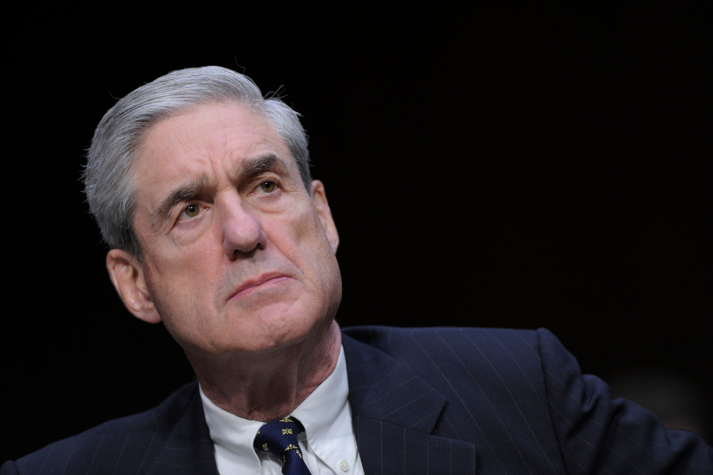 FILE - FBI Director Robert S. Mueller III testifies before the Senate Intelligence Committee on Capitol Hill in Washington, March 12, 2013. Mueller died on Friday, March 20, 2026. He was 81. (AP Photo/Susan Walsh, File)