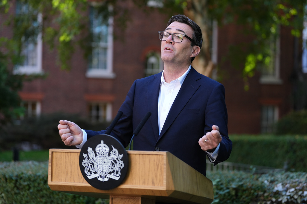 Britain's Prime Minister Andy Burnham gives a speech during a reception at 10 Downing Street, London, Monday Sept. 21, 2026, to recognise the contribution of organisations and volunteers who supported communities across the UK this summer, through the recent heatwaves, wildfires and other emergencies. (Jonathan Brady/Pool Photo via AP)