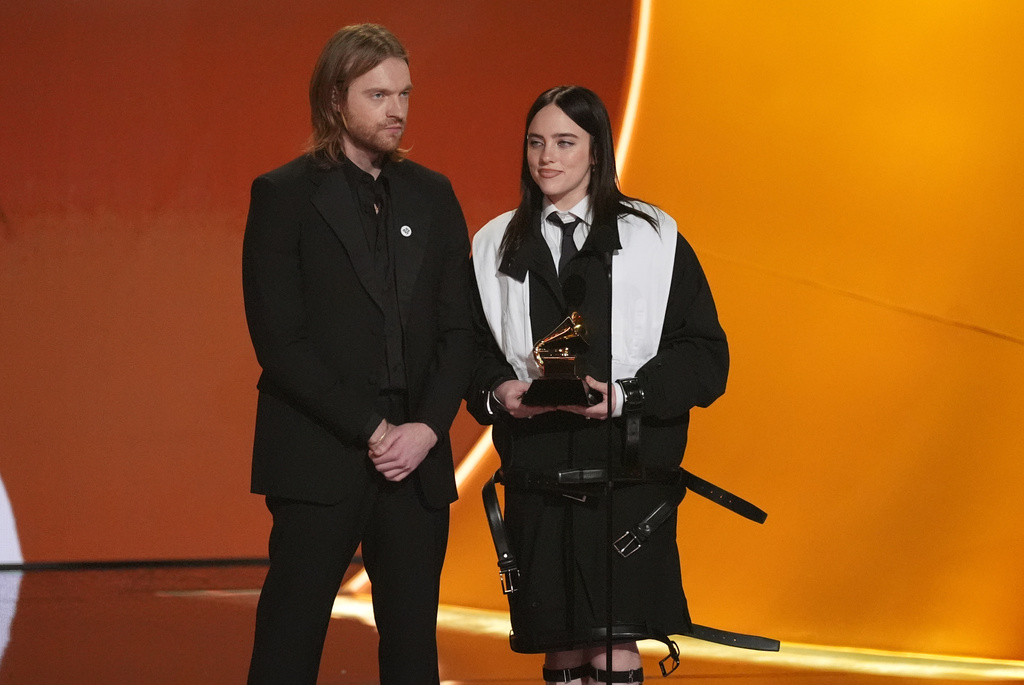 Finneas, left, and Billie Eilish accept the award for song of the year for "Wildflower" during the 68th annual Grammy Awards on Sunday, Feb. 1, 2026, in Los Angeles. (AP Photo/Chris Pizzello)