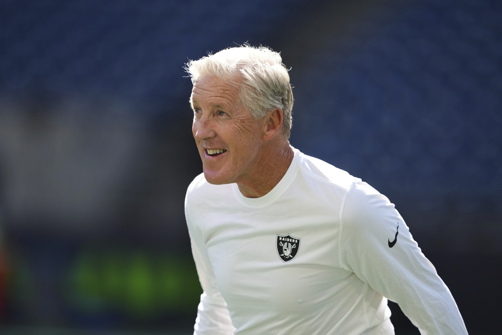 Las Vegas Raiders head coach Pete Carroll stands on the field before an NFL preseason football game against the Seattle Seahawks, Thursday, Aug. 7, 2025, in Seattle. (AP Photo/Lindsey Wasson)