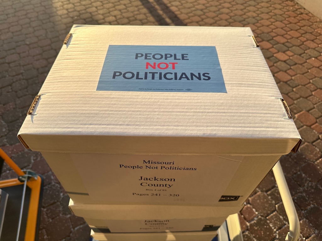 Boxes of petition signatures are stacked up to be delivered Tuesday, Dec. 9, 2025, to the secretary of state's office in Jefferson City, Mo., calling for a referendum election on new U.S. House districts approved by the Missouri legislature. (AP Photo/David A. Lieb)