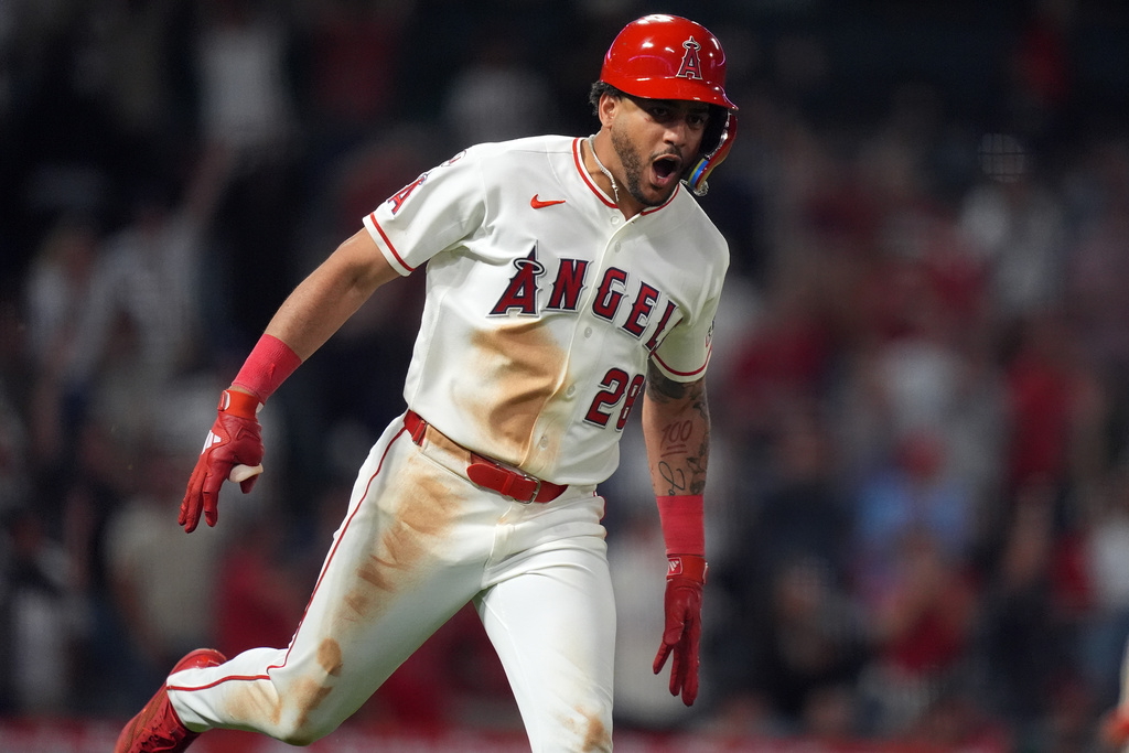 Los Angeles Angels Jose Siri celebrates his game-winning single against the Houston Astros during the 10th inning of a baseball game Wednesday, June 10, 2026, in Anaheim, Calif. (AP Photo/Scott Strazzante)