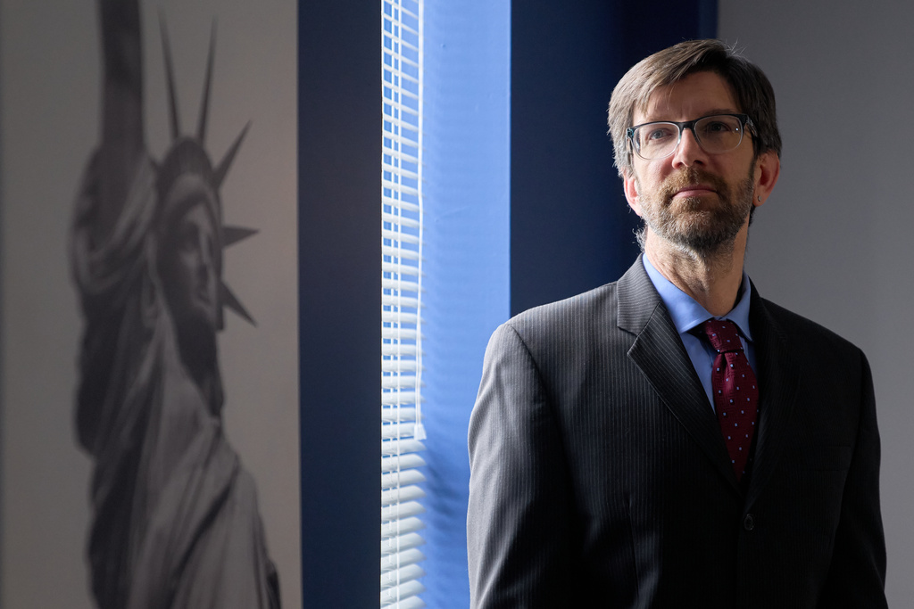 Simon Sandoval-Moshenberg, a lawyer on Kilmar Abrego Garcia's legal team who specializes in federal immigration cases, poses for a portrait in Fairfax, Va., Monday, Dec. 15, 2025. (AP Photo/Jacquelyn Martin)
