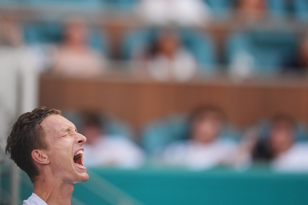 Jiri Lehecka of the Czech Republic shouts as he celebrates after winning a semifinal match against Arthur Fils of France, at the Miami Open tennis tournament, Friday, March 27, 2026, in Miami Gardens, Fla. (AP Photo/Rebecca Blackwell)