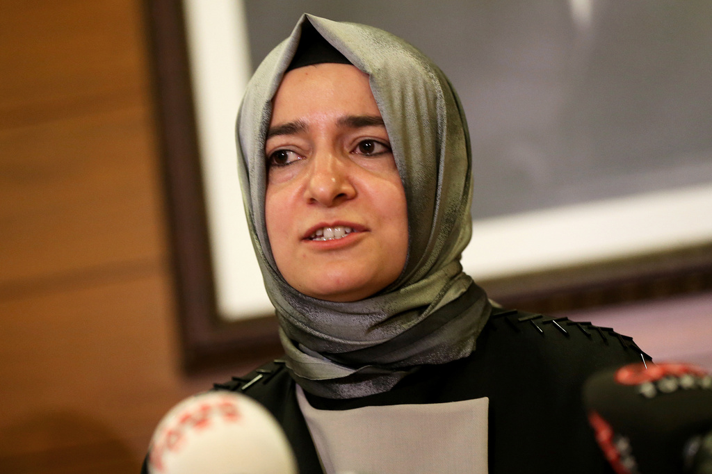 FILE - Fatma Betul Sayan Kaya, Turkey's Minister of Family Affairs, speaks to the media at Ataturk Airport in Istanbul on March 12, 2017. (AP Photo, File)