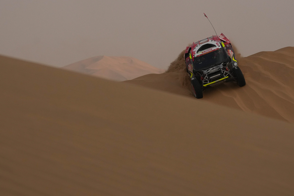 Driver Martin Prokop and co-driver Viktor Chytka compete during the tenth stage of the Dakar Rally between Wadi Ad Dawasir and Bisha, Saudi Arabia, Wednesday, Jan.14, 2026. (AP Photo/Thibault Camus)