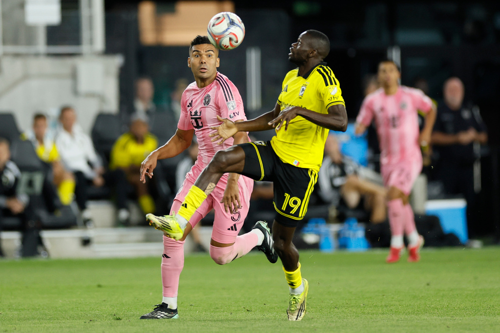 Columbus Crew's Jamal Thiare, right, controls the ball as Inter Miami's Carlos Casemiro,m left, defends during the second half of an MLS soccer match, Sunday, Sept. 27, 2026, in Columbus, Ohio. (AP Photo/Jay LaPrete)